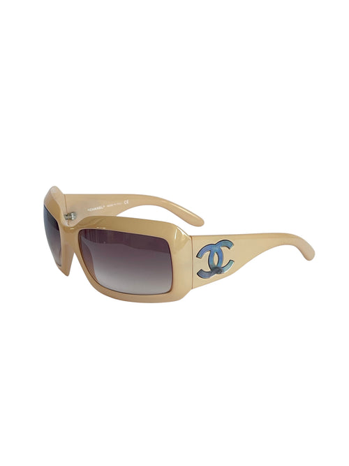 MODEVESTIGE vintage CHANEL beige shield sunglasses with gradient brown lenses and mother-of-pearl CC logo on temples.