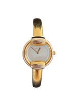 MODEVESTIGE vintage Gucci 1400L gold-plated bangle watch with a minimalist white dial and Swiss quartz movement.